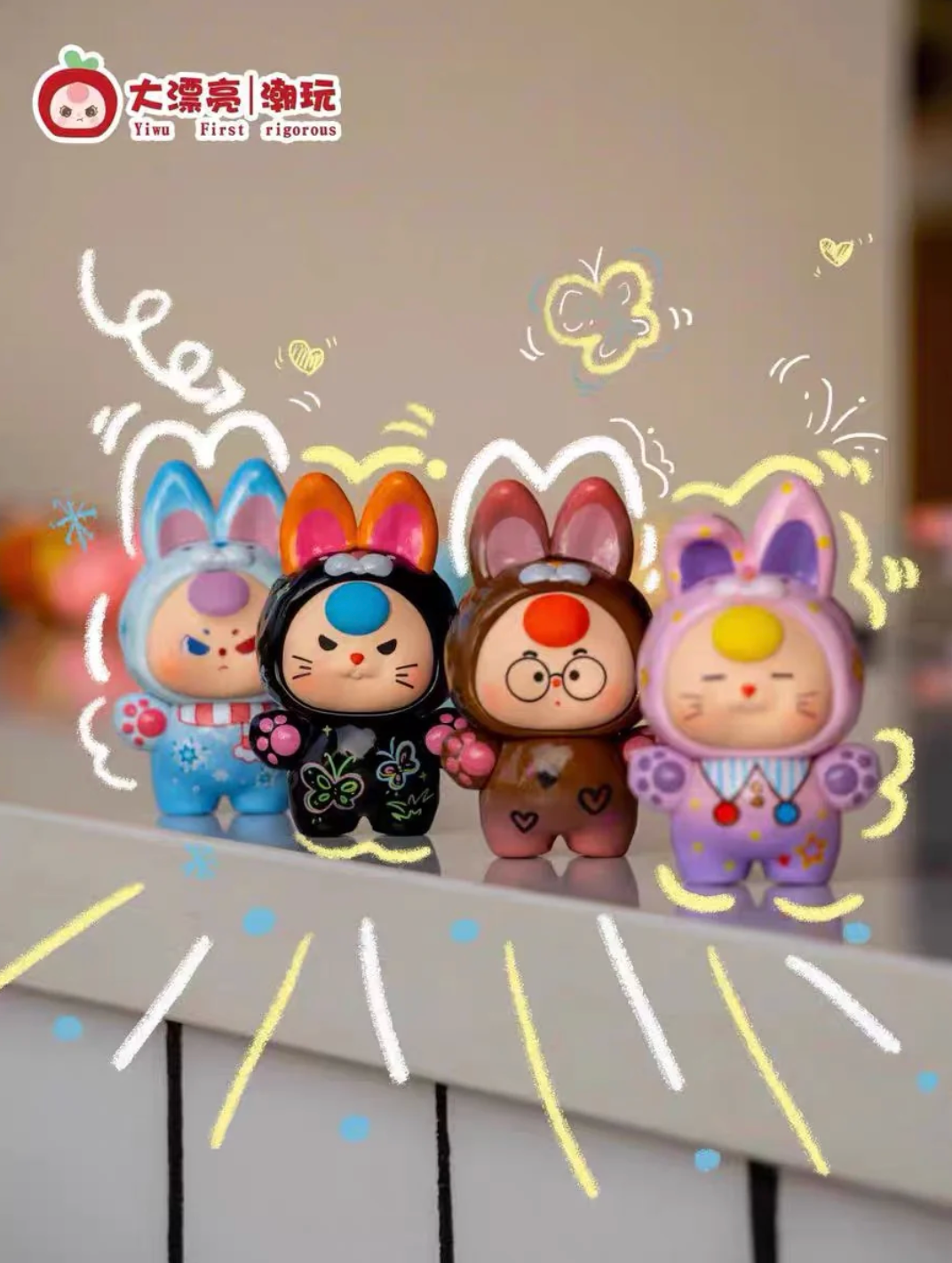 Four colorful cartoon figurines with bunny ears on a shelf, featuring a brand logo in the corner.