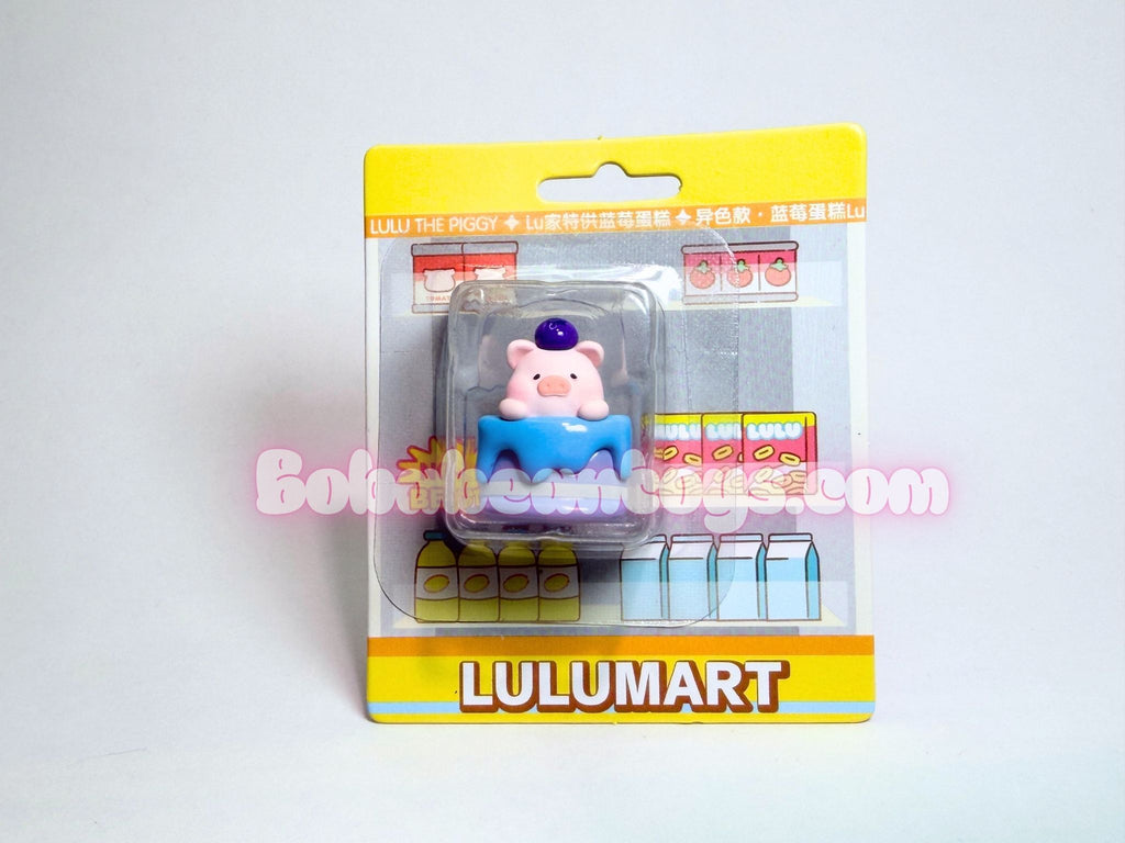Piggy bank figurine in packaging with Lulumart branding on a white background