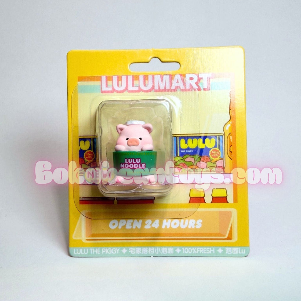 Pink piggy bank figure in a clear plastic window on a yellow Lulumart packaging with a gray background.