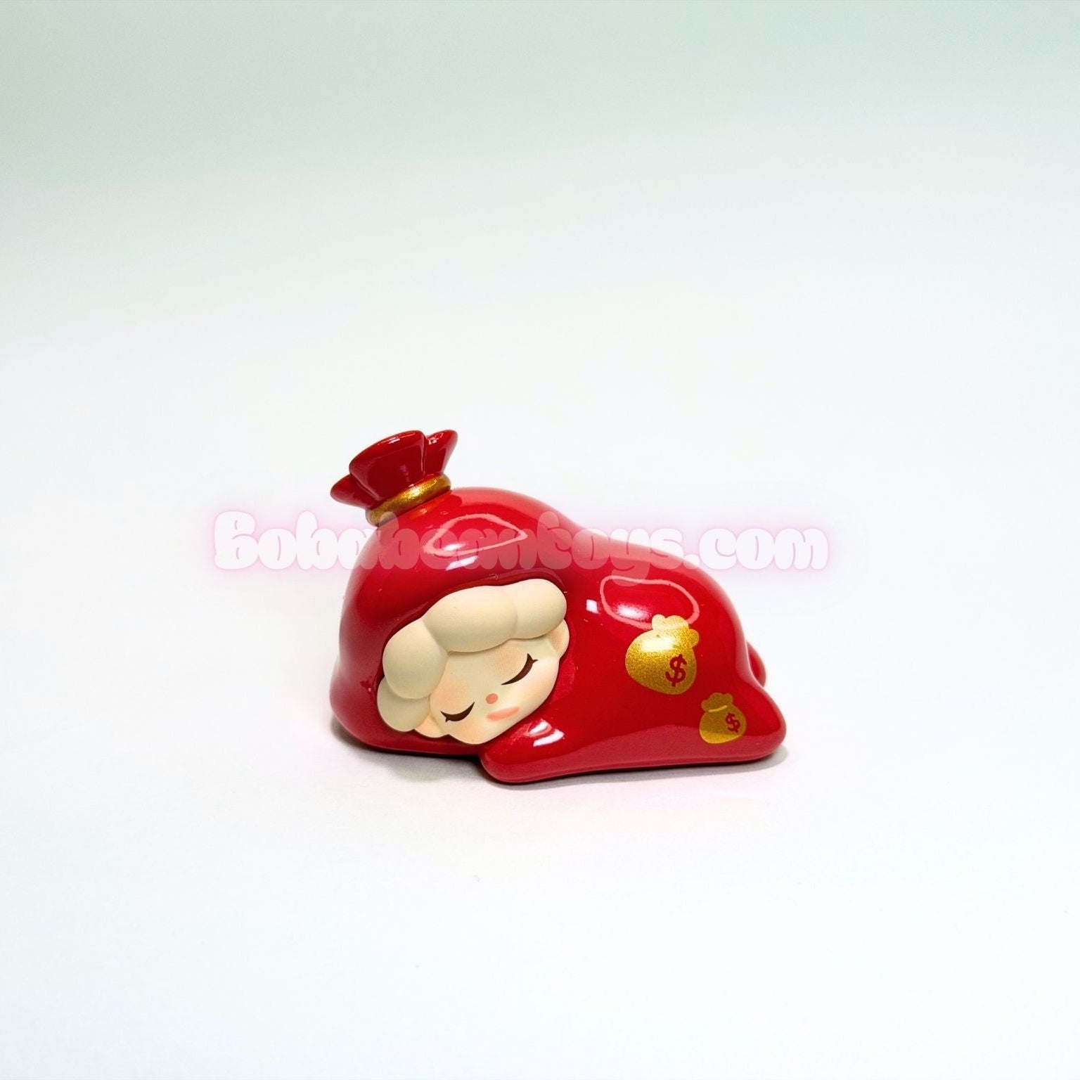 Red money bag shaped like a cartoon character on a white background