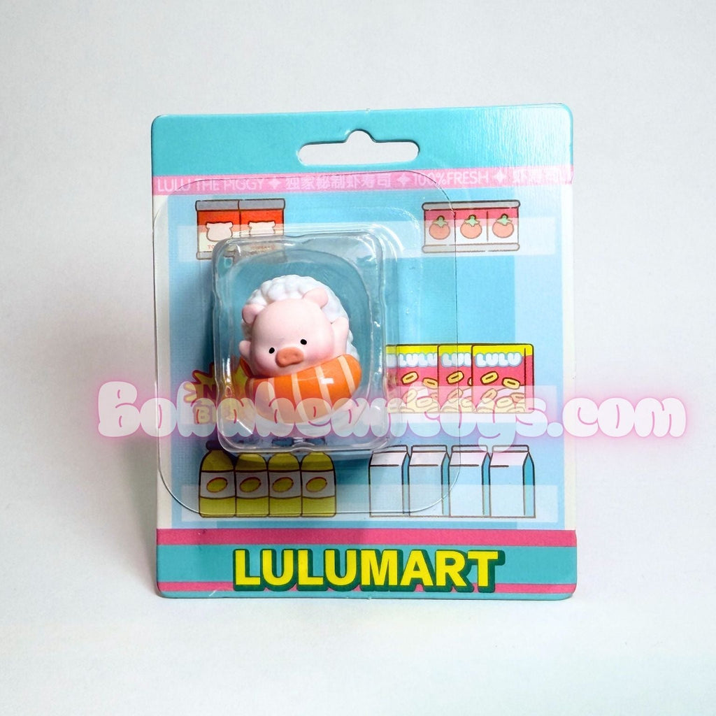 Toy figure in packaging with Lulumart branding on a white background