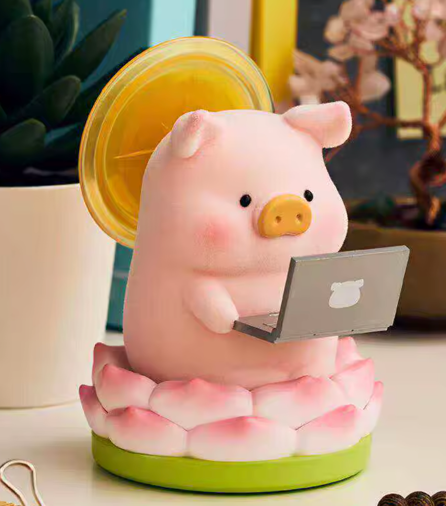 Pink piggy with a laptop on a decorative stand